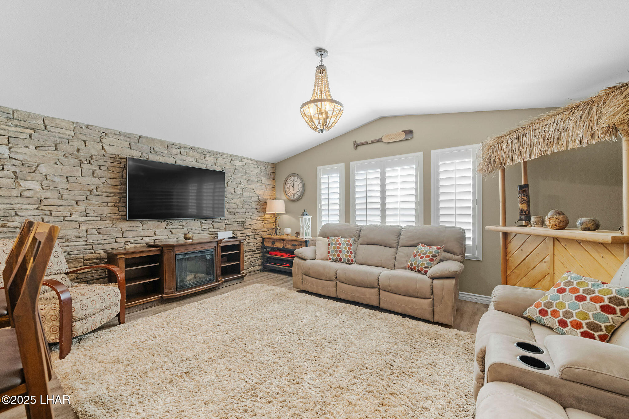 3020 Parker Dam Road, Unit 11 Parker, AZ 85344 - Photo 15 of 58 a living room with furniture and a flat screen tv