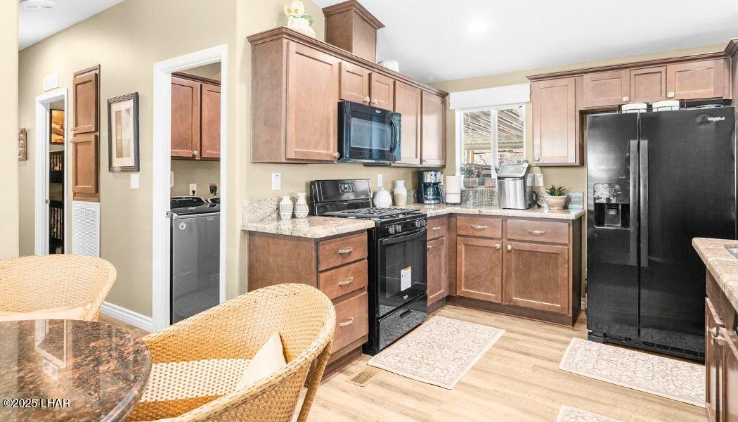 3020 Parker Dam Road, Unit 11 Parker, AZ 85344 - Photo 20 of 58 a kitchen with stainless steel appliances a refrigerator stove top oven and sink