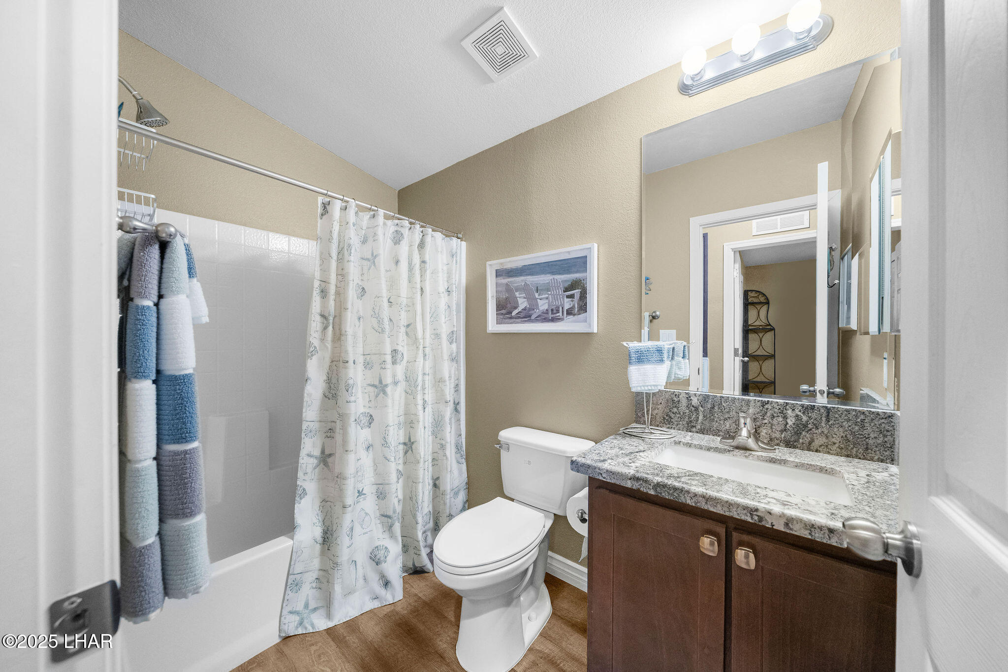 3020 Parker Dam Road, Unit 11 Parker, AZ 85344 - Photo 28 of 58 a bathroom with a granite countertop sink toilet and shower