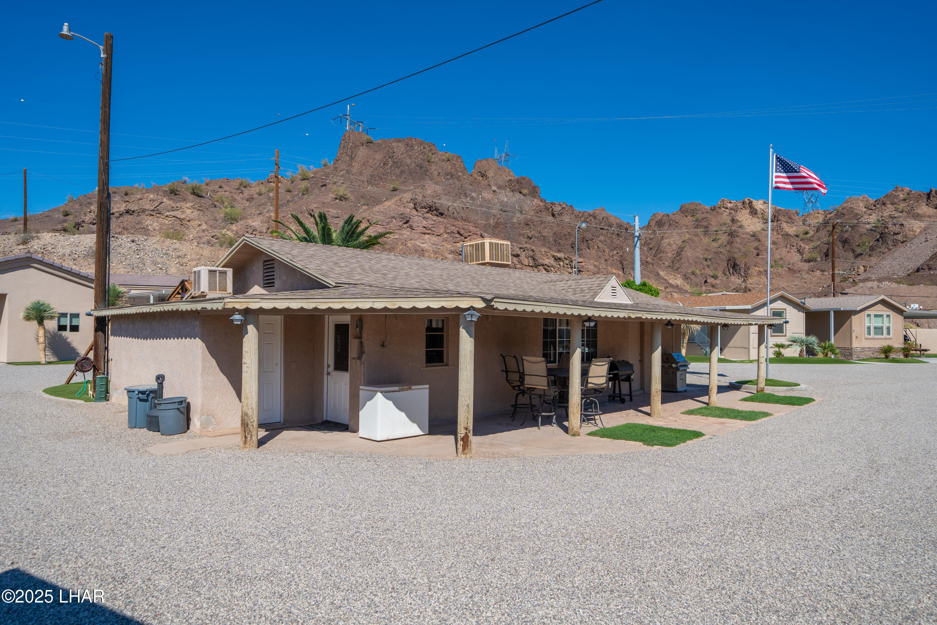 3020 Parker Dam Road, Unit 11 Parker, AZ 85344 - Photo 38 of 58 a view of a house with basketball court