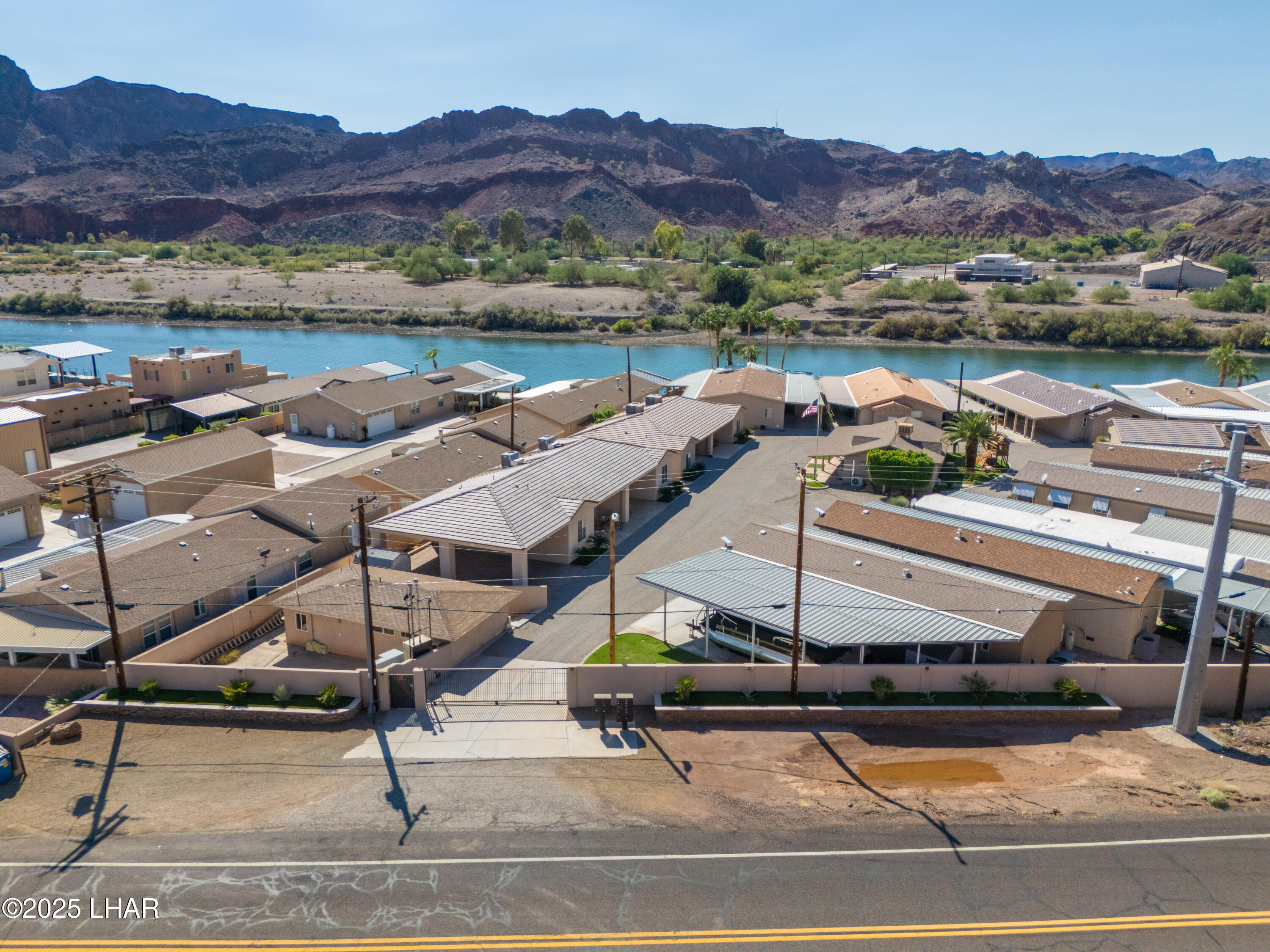 3020 Parker Dam Road, Unit 11 Parker, AZ 85344 - Photo 57 of 58 a view of a swimming pool with mountain view and mountain view