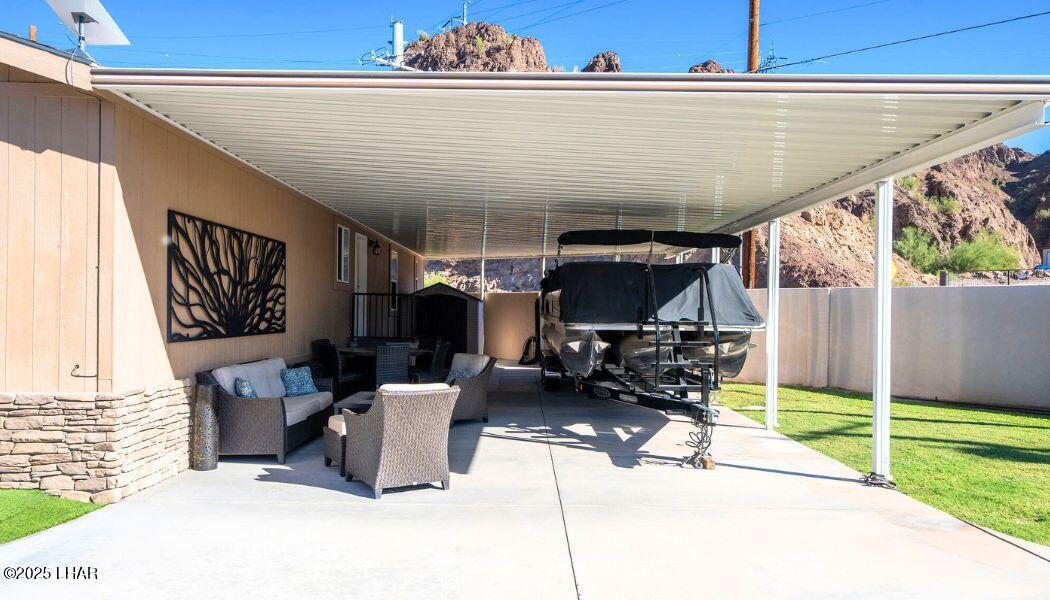 3020 Parker Dam Road, Unit 11 Parker, AZ 85344 - Photo 6 of 58 a building outdoor space with patio furniture and garden