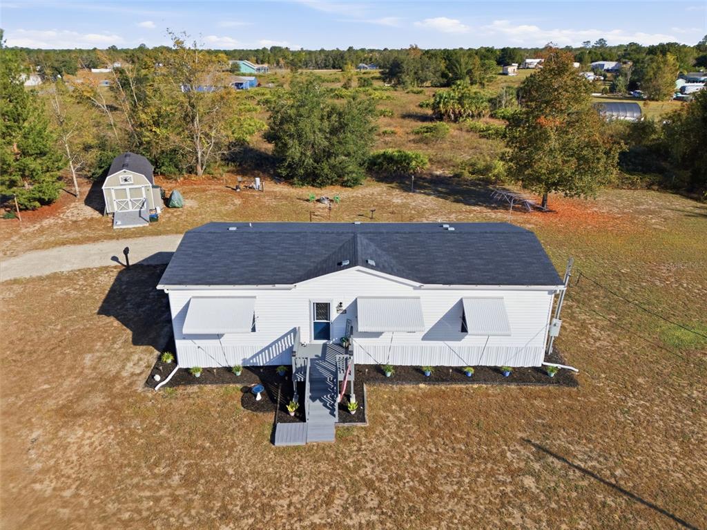 12441 Hexam Road Weeki Wachee, FL 34614 - Photo 36 of 46 an outdoor space with furniture and city view