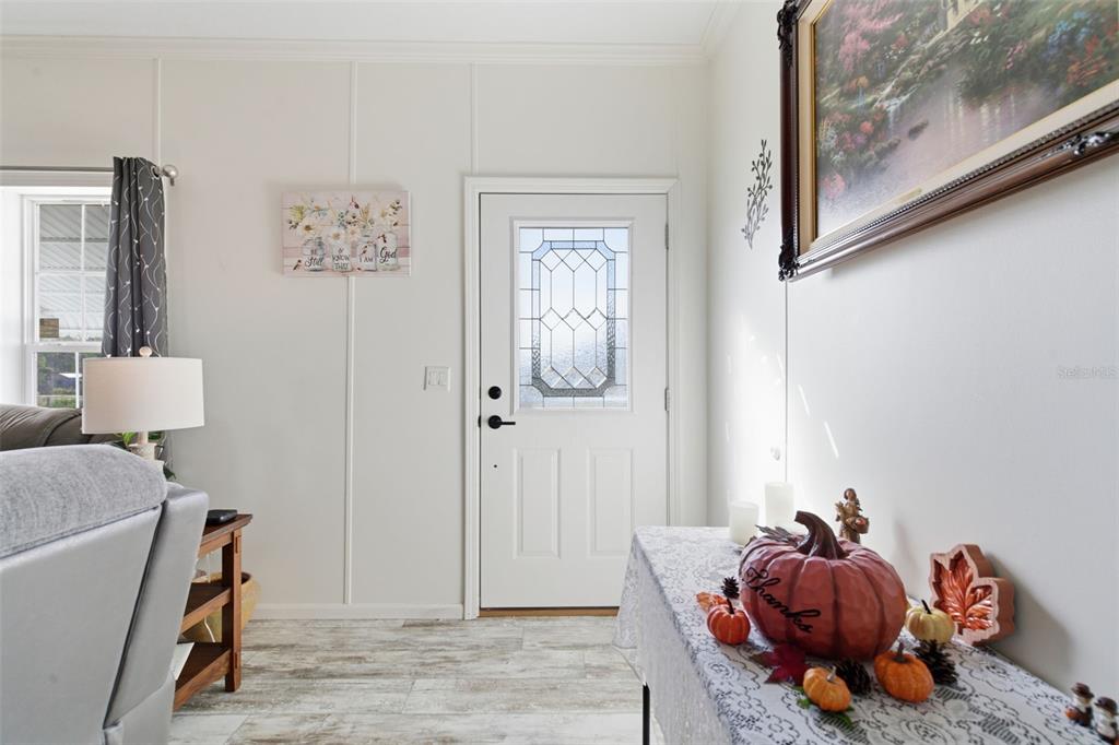 12441 Hexam Road Weeki Wachee, FL 34614 - Photo 8 of 46 a living room with furniture and wooden floor