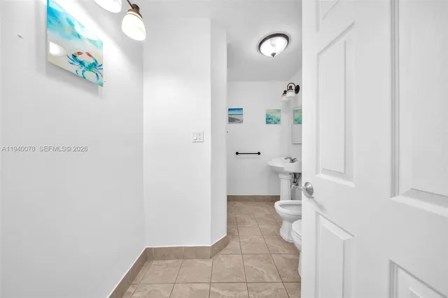 a bathroom with a sink and a toilet