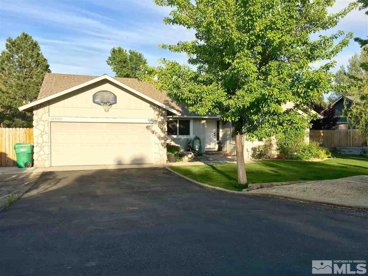 12530 Overbrook Drive Reno, NV 89511 - Photo 1 of 1 a front view of a house with garden