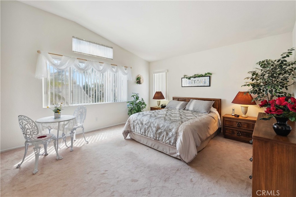 414 Helix Way Oceanside, CA 92057 - Photo 20 of 49 a bedroom with a bed and a table chair