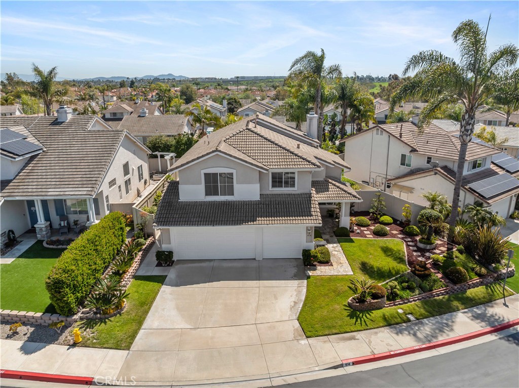 414 Helix Way Oceanside, CA 92057 - Photo 43 of 49 a aerial view of a house with a yard and potted plants