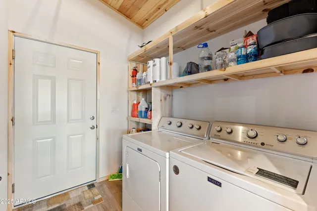a utility room with dryer and washer