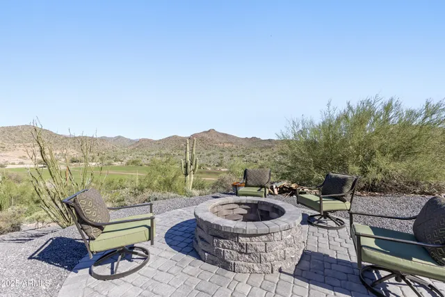 a view of a chairs and table in the terrace