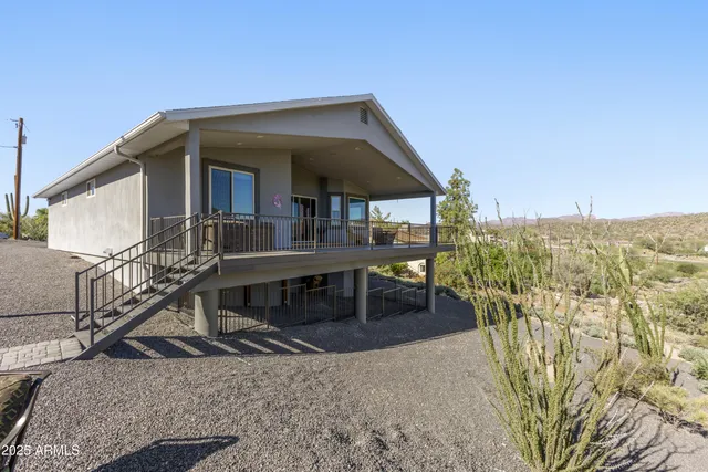 a view of a house with large windows