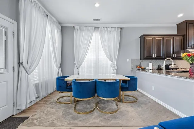 a kitchen with a sink and a cabinets