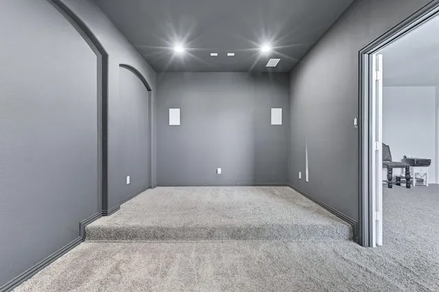 a view of a hallway with a chair