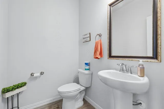 a bathroom with a sink and a toilet