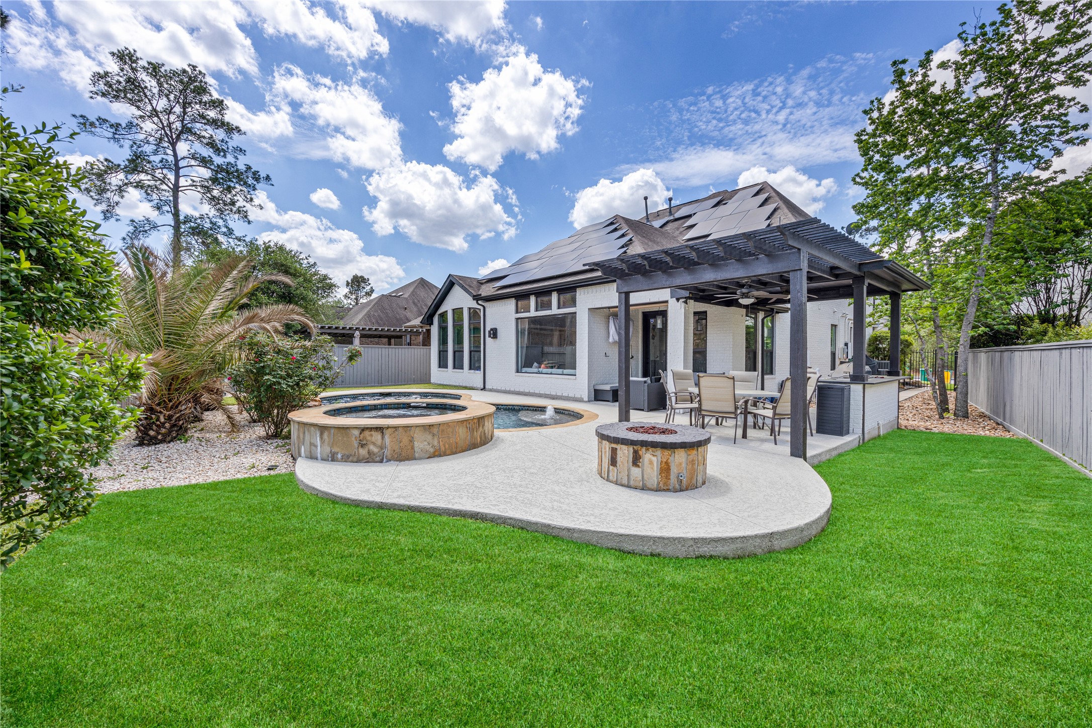 14 Rancher's Trail The Woodlands, TX 77375 - Photo 4 of 27 Backyard