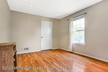 503 Harding Road, Unit 6 Freehold, NJ 07728 - Photo 20 of 23 a view of empty room with window