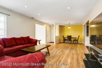 503 Harding Road, Unit 6 Freehold, NJ 07728 - Photo 5 of 23 a living room with furniture and a table