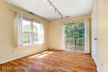 503 Harding Road, Unit 6 Freehold, NJ 07728 - Photo 8 of 23 a view of an empty room with a window