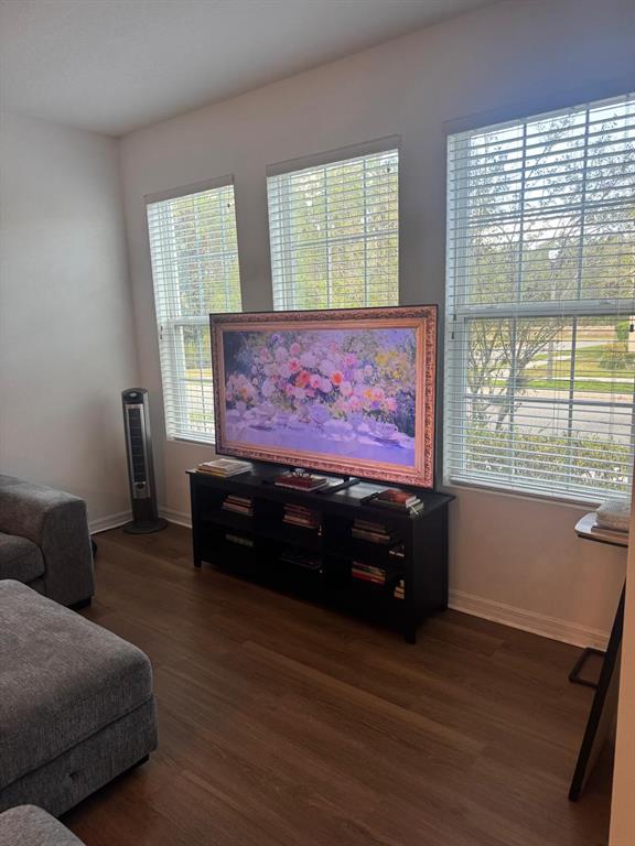 5706 Cypress Hill Road Winter Garden, FL 34787 - Photo 7 of 21 a living room with furniture and a window