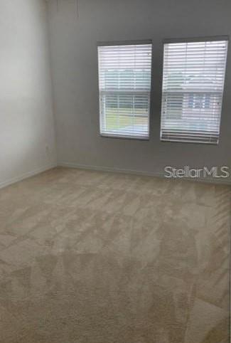 5706 Cypress Hill Road Winter Garden, FL 34787 - Photo 10 of 21 an empty room with a window