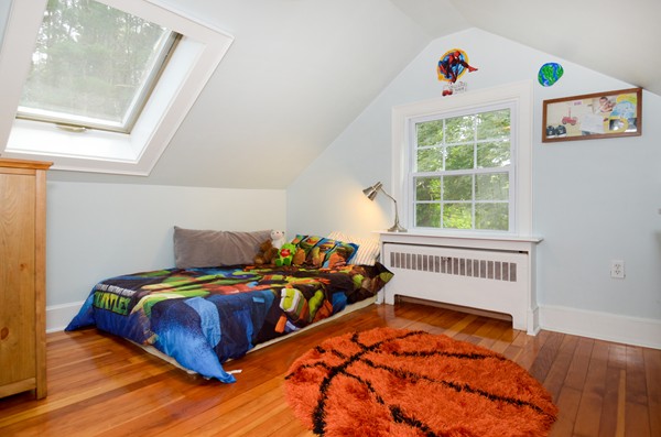 50 Topsfield Road Ipswich, MA 01938 - Photo 20 of 29 a bedroom with a bed and a window