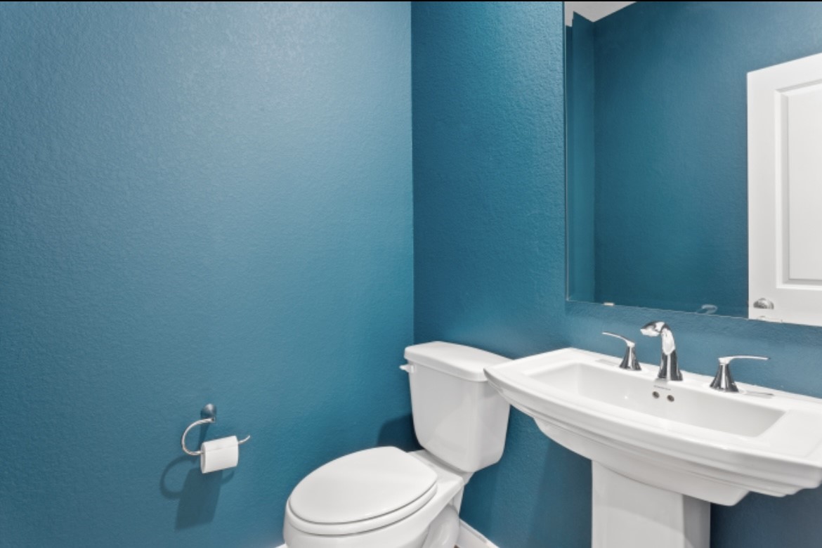 10227 Van Gogh Court Iowa Colony, TX 77578 - Photo 18 of 25 Convenient powder room located just off the entry foyer for guest.