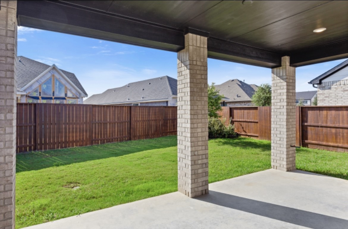10227 Van Gogh Court Iowa Colony, TX 77578 - Photo 20 of 25 Extended patio upgrade, perfect for outdoor entertaining and enjoying the backyard with gas connection for outdoor cooking.
