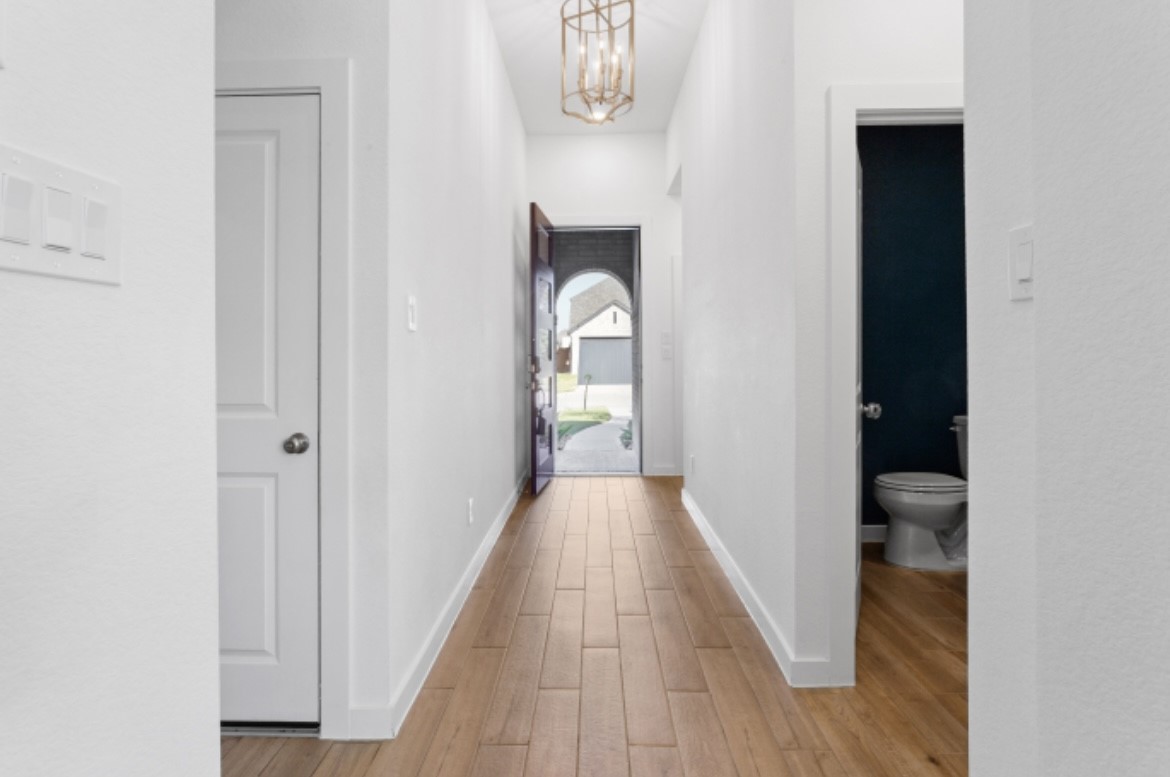 10227 Van Gogh Court Iowa Colony, TX 77578 - Photo 3 of 25 Foyer view to door.