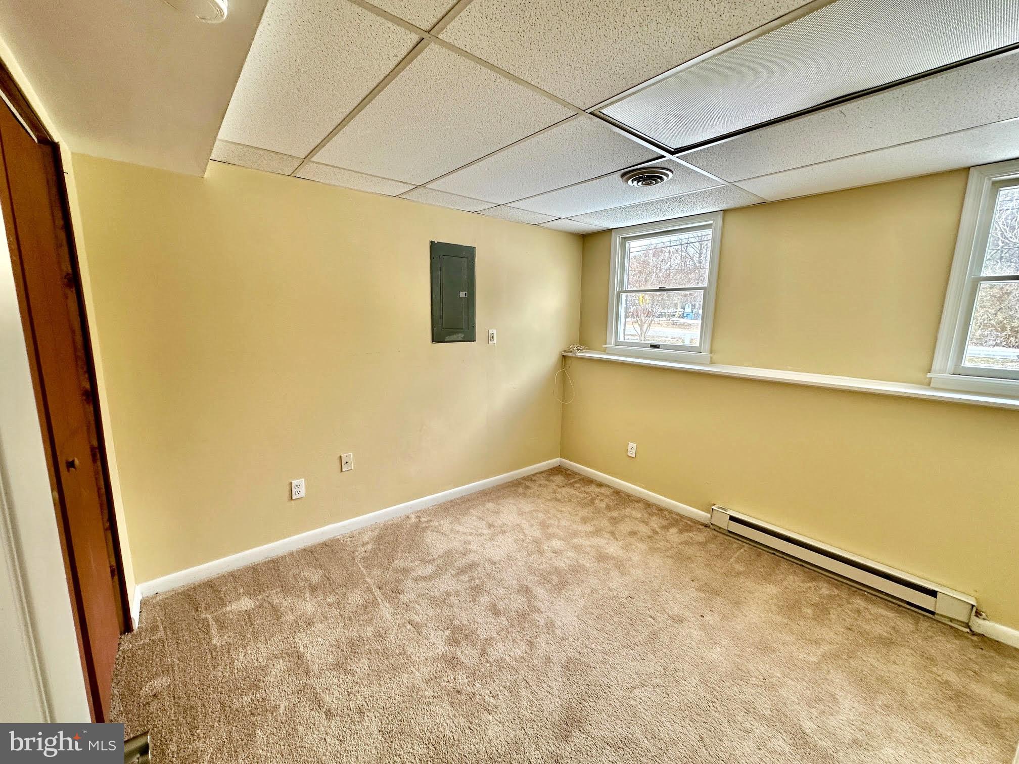 119 Cove Point Road Lusby, MD 20657 - Photo 18 of 22 a view of a big room with wooden floor