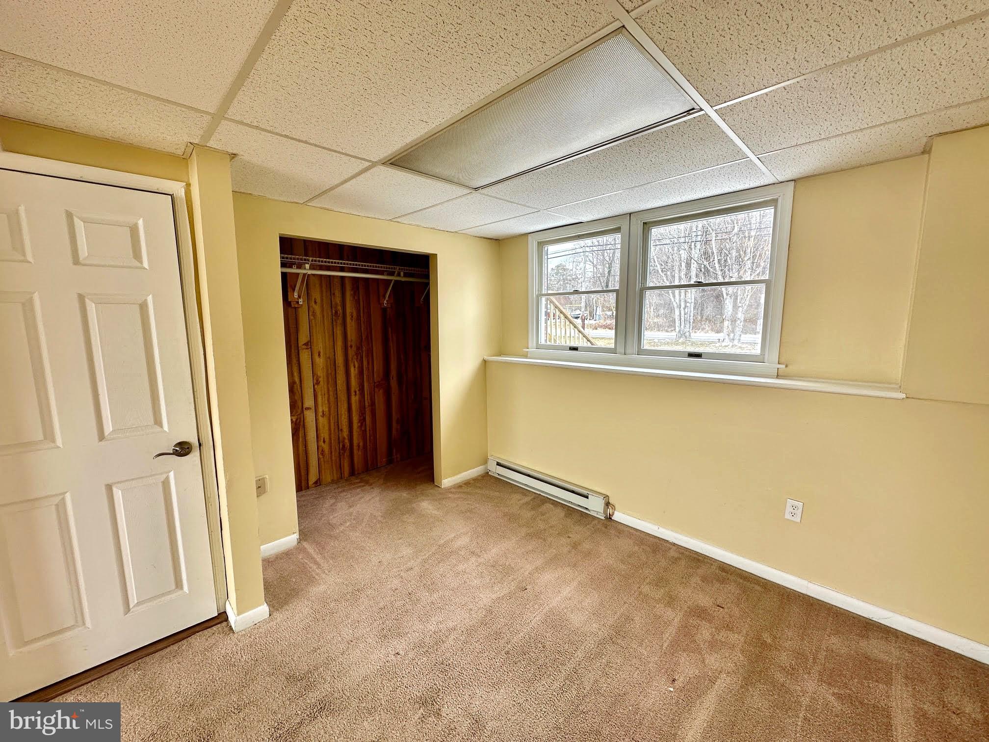 119 Cove Point Road Lusby, MD 20657 - Photo 20 of 22 Lower level bedroom 4 or rec room