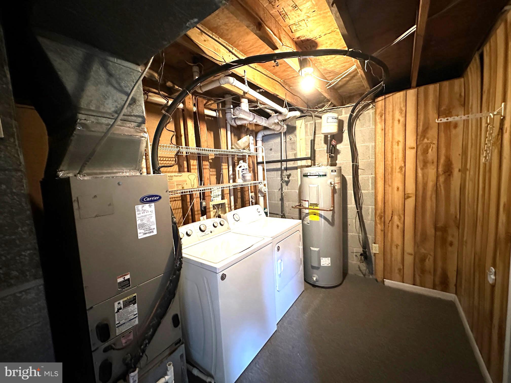 119 Cove Point Road Lusby, MD 20657 - Photo 22 of 22 a utility room with dryer and washer