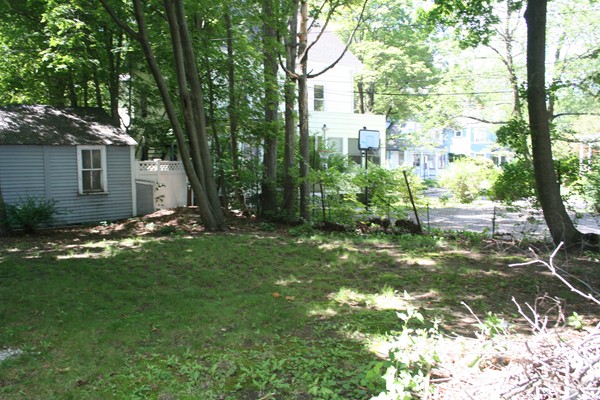 355 Walnut Street Newton, MA 02460 - Photo 4 of 5 a view of backyard of house with green space