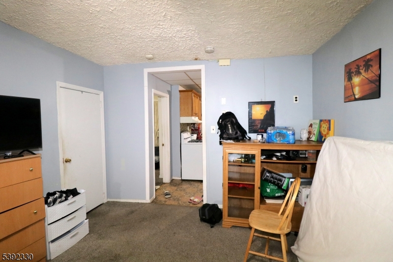 233 Adams Street Newark, NJ 07105 - Photo 7 of 14 a view of a workspace with furniture