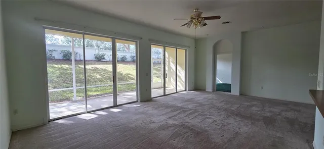 a view of a room with natural light