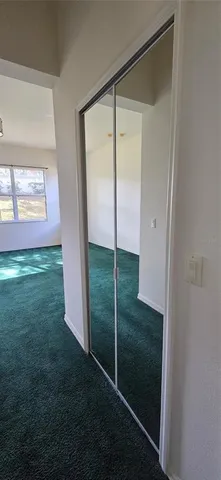 a bathroom with a shower and a mirror