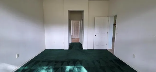 a view of entryway and hall with a window