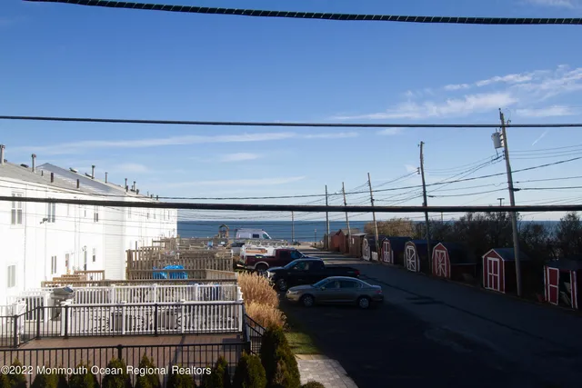 a view of a balcony with furniture