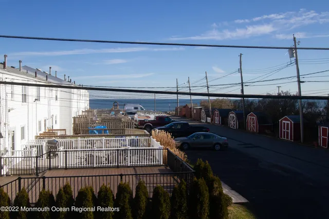 a kitchen with stainless steel appliances granite countertop a stove and a microwave