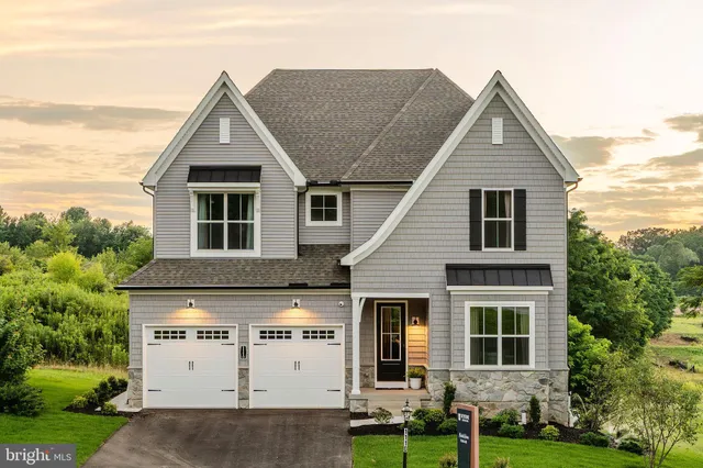 a view of house with yard