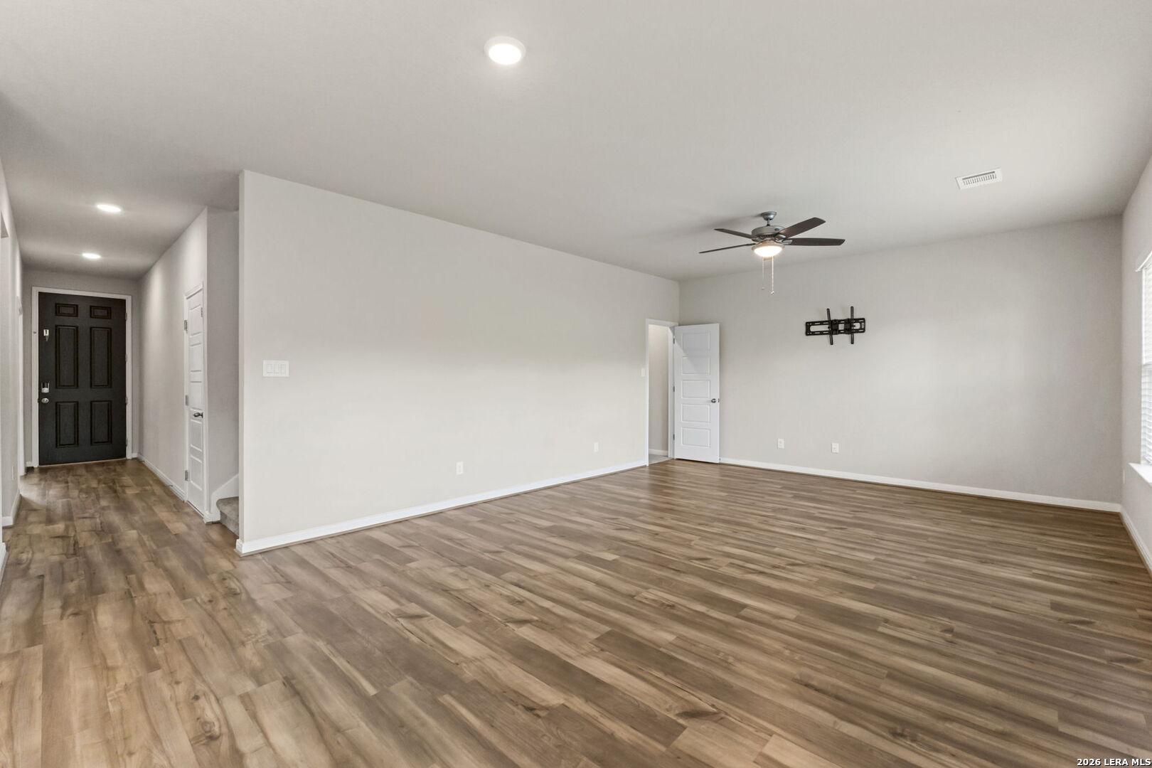 12221 Icon Ridge San Antonio, TX 78253 - Photo 7 of 46 a view of empty room with wooden floor