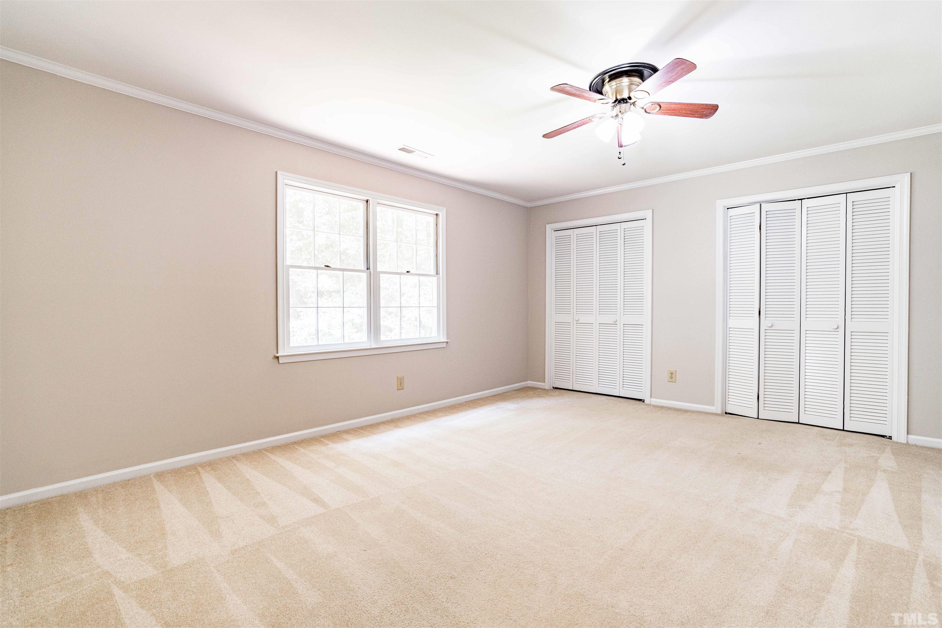 8645 Valley Brook Drive Raleigh, NC 27613 - Photo 22 of 32 a view of an empty room with a window
