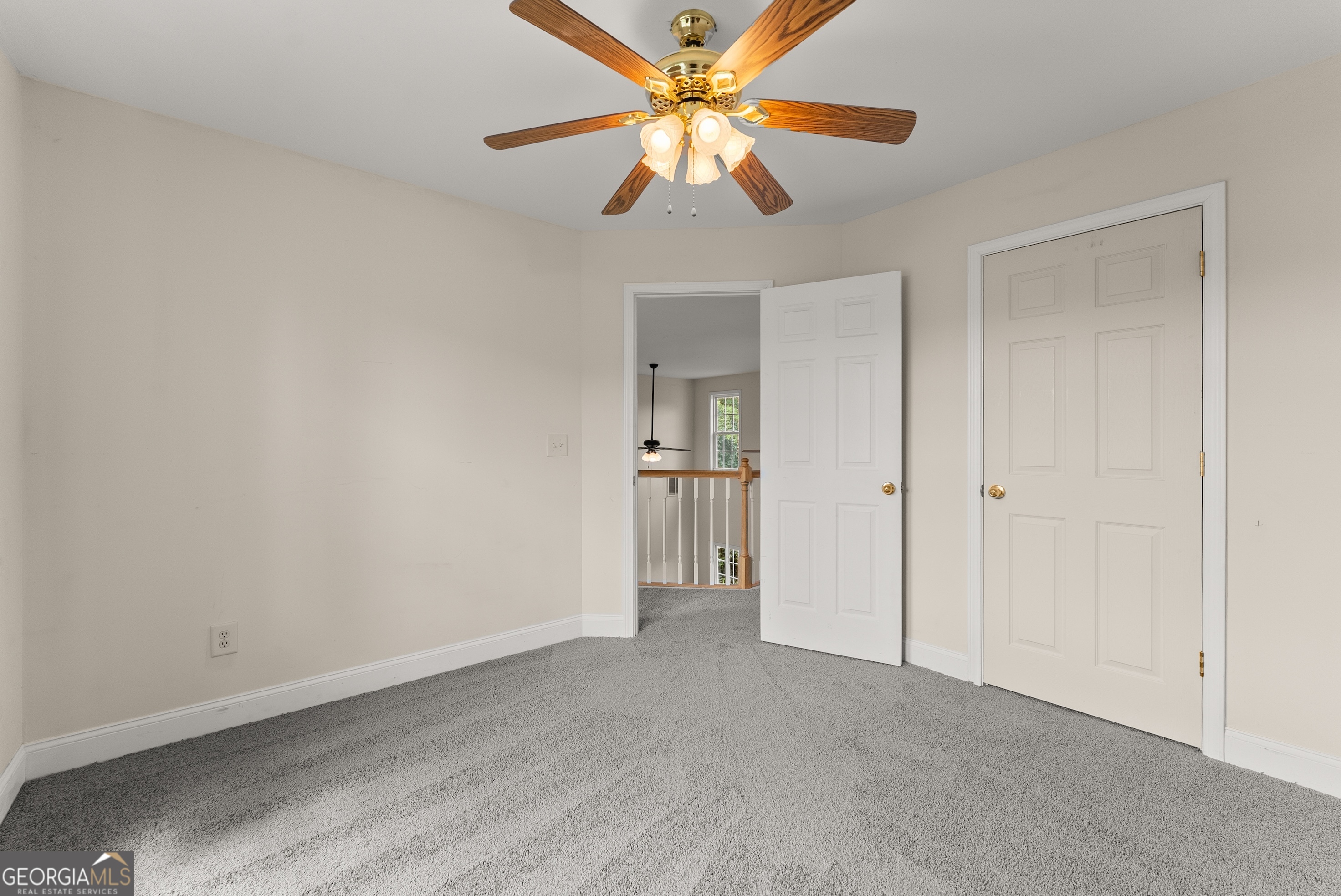 930 Heads Ferry Road Cornelia, GA 30531 - Photo 30 of 43 a view of an empty room and chandelier fan
