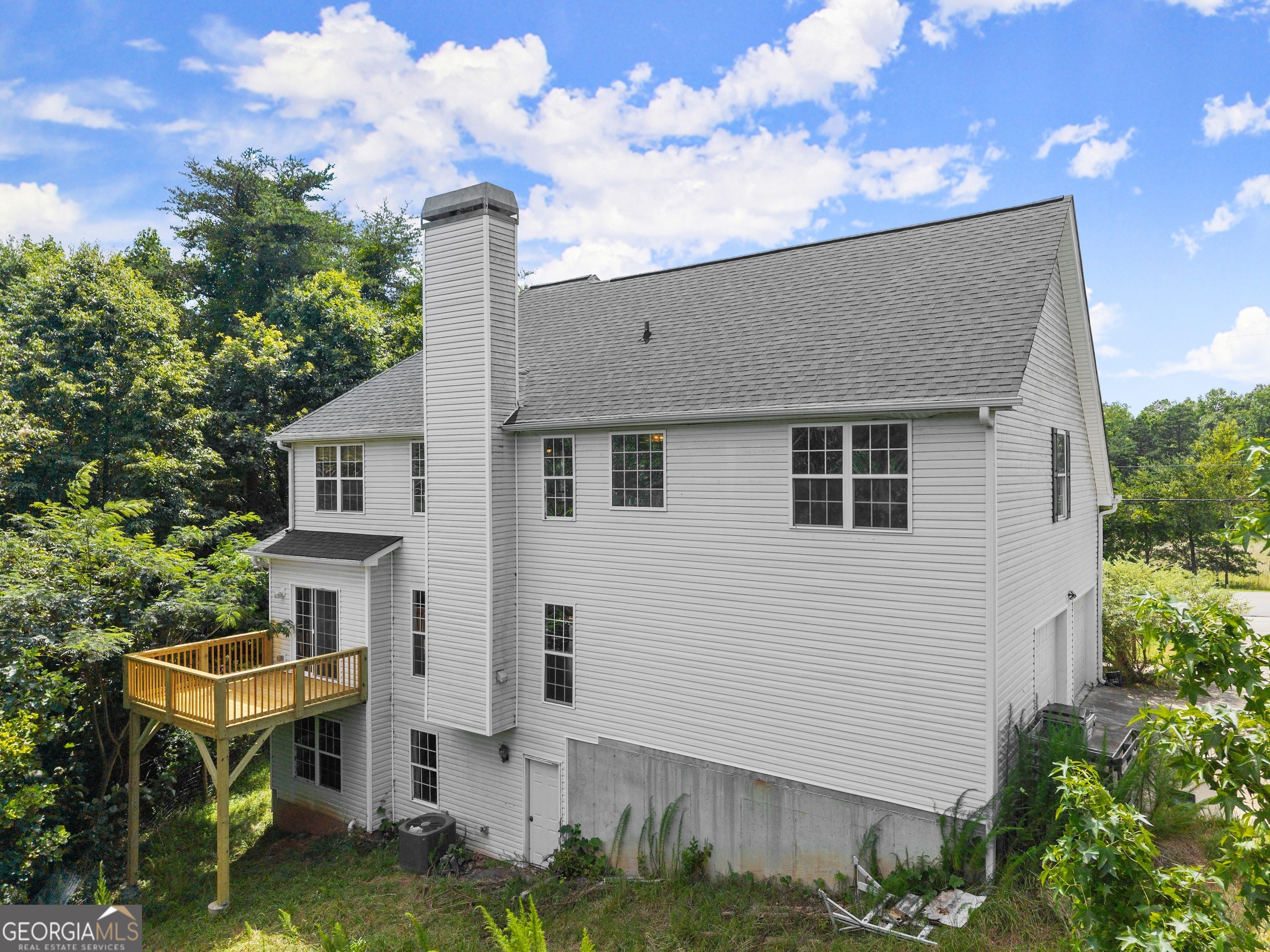 930 Heads Ferry Road Cornelia, GA 30531 - Photo 38 of 43 a front view of a house with garden