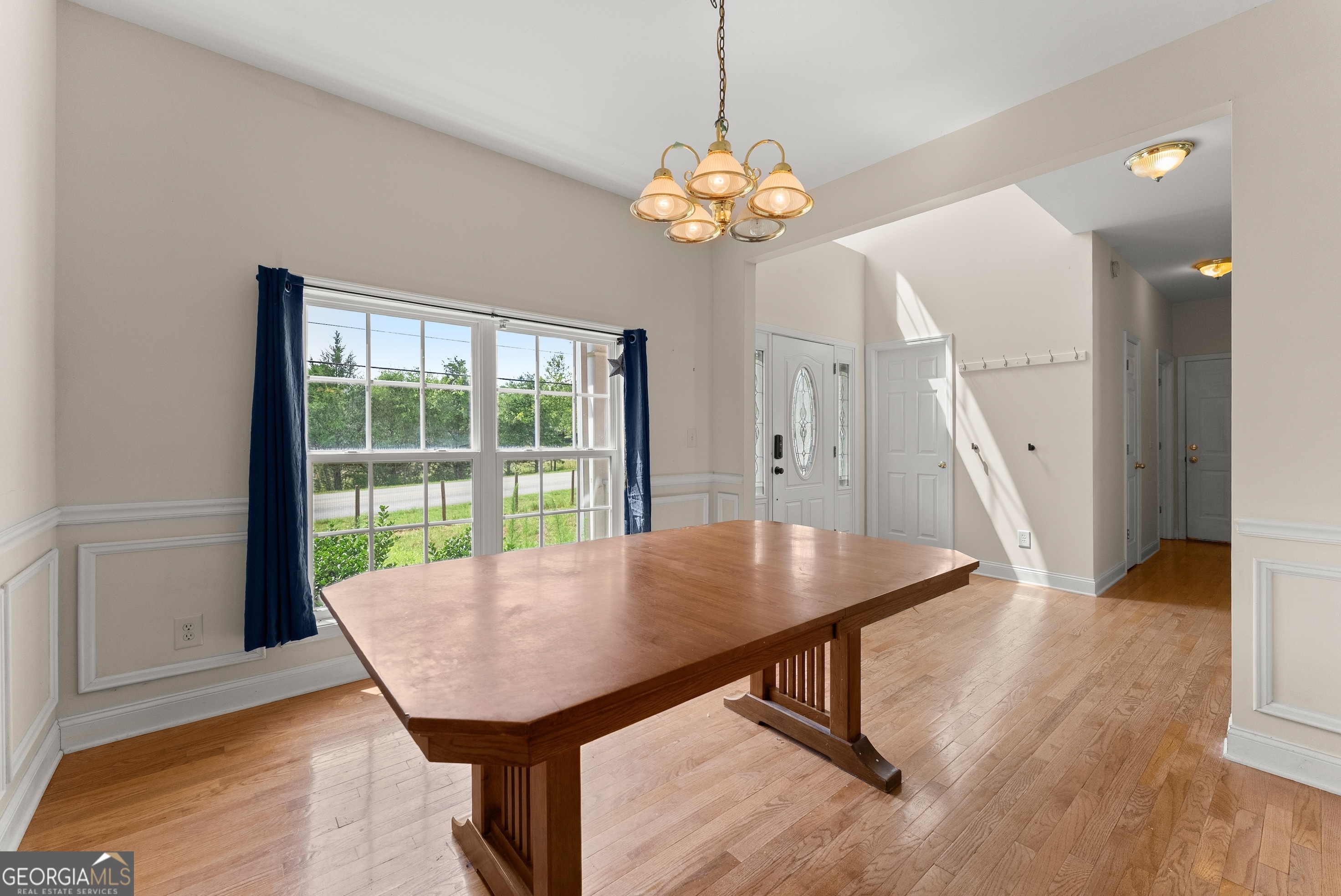 930 Heads Ferry Road Cornelia, GA 30531 - Photo 6 of 43 a view of a dining room with furniture and wooden floor