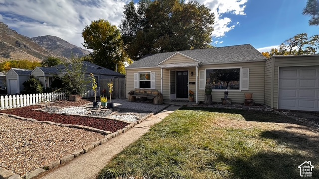 964 300 North Provo, UT 84606 - Photo 3 of 4 Siding exterior featuring a prominent picture window with shutters