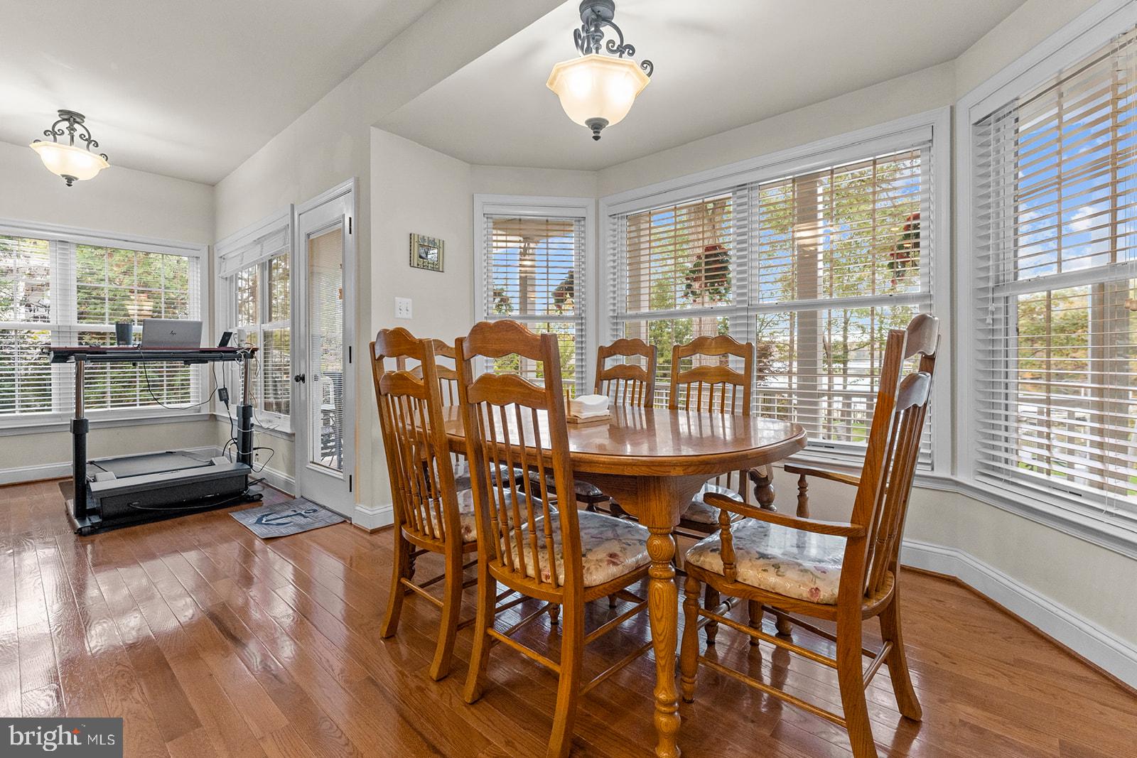 32 Dobe Point Road Stafford, VA 22554 - Photo 11 of 38 a view of a dining room with furniture window and wooden floor