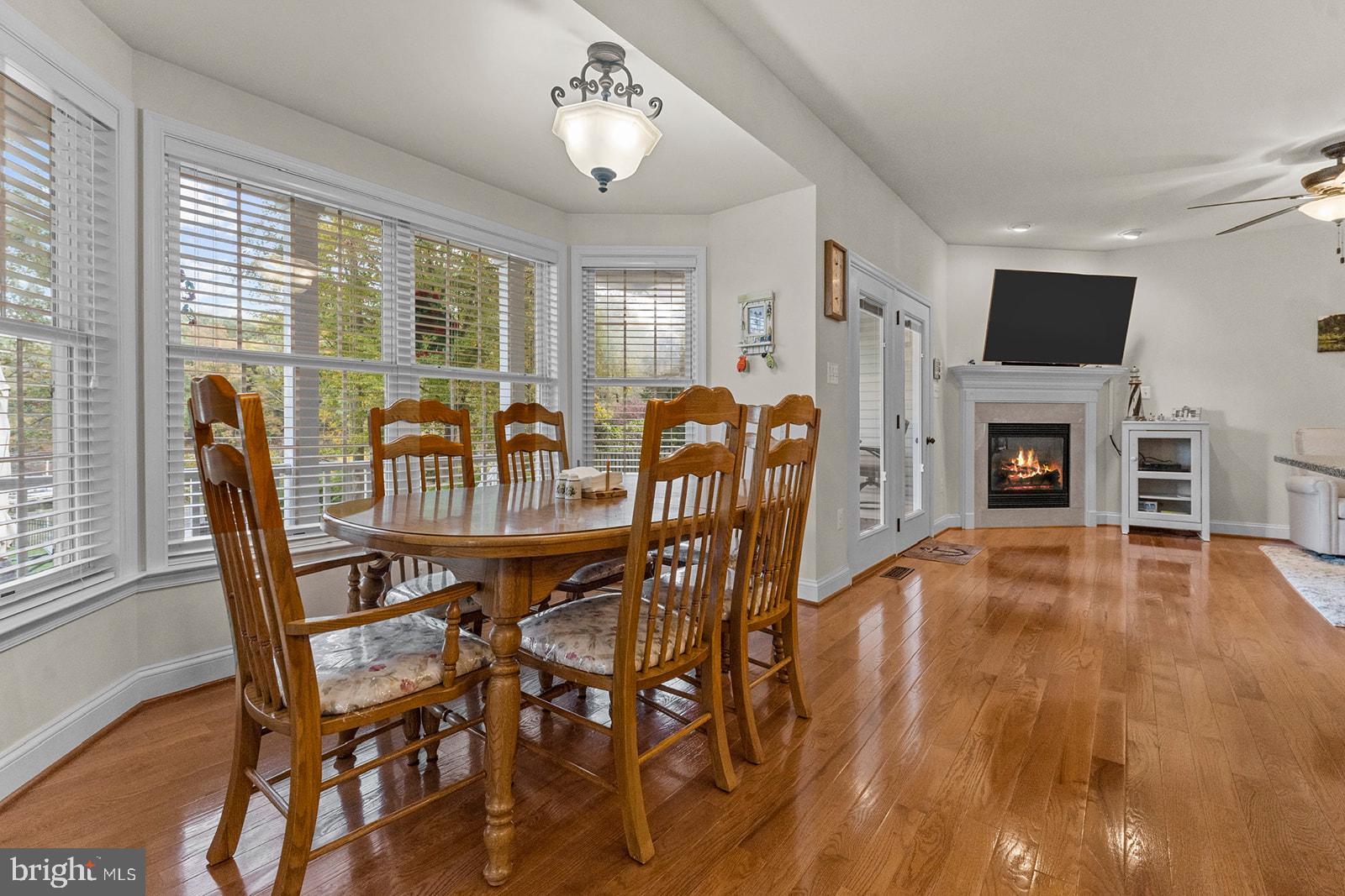 32 Dobe Point Road Stafford, VA 22554 - Photo 10 of 38 a view of a dining room with furniture window and wooden floor