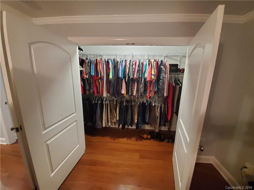 4501 Farmbrook Road Gastonia, NC 28056 - Photo 22 of 23 a view of walk in closet with clothes