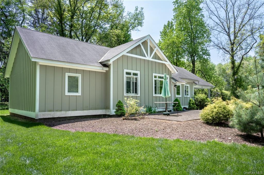 15 Sickletown Road Pearl River, NY 10965 - Photo 30 of 35 a front view of a house with a garden