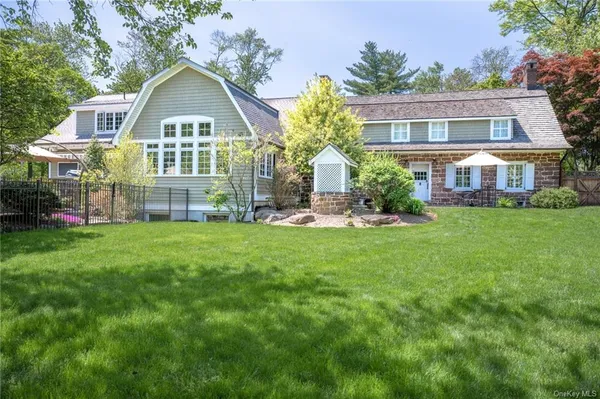 a house view with a garden space